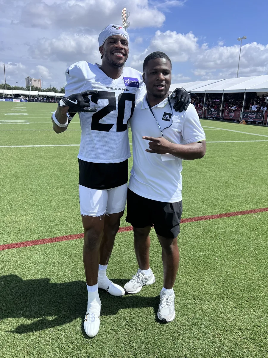 True Path Management staff with a Houston Texans player at training camp